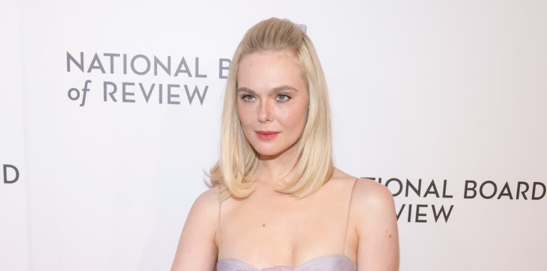 Elle Fanning Pairs a Baby-Doll Dress With Faux Fur and Blinding Rubies