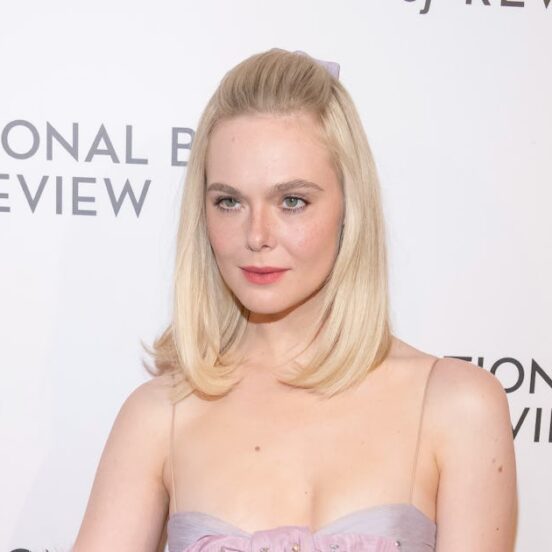 Elle Fanning Pairs a Baby-Doll Dress With Faux Fur and Blinding Rubies