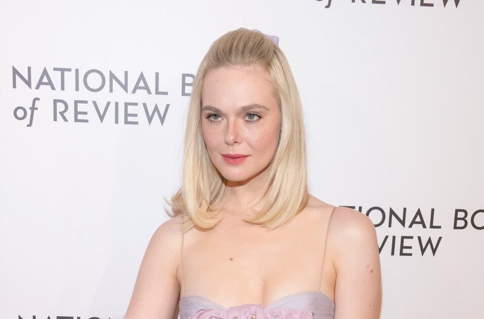 Elle Fanning Pairs a Baby-Doll Dress With Faux Fur and Blinding Rubies